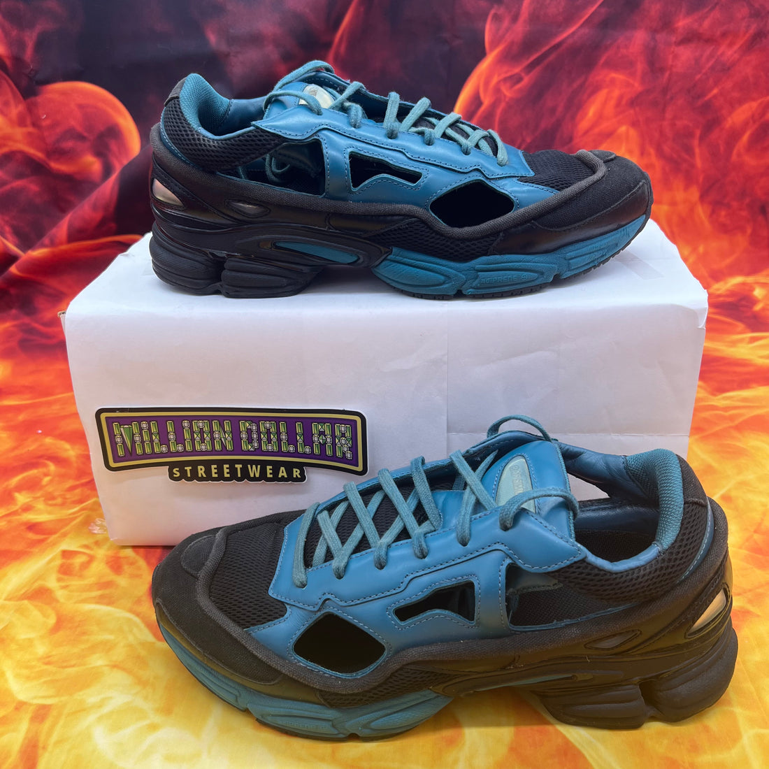 Raf Simon’s replicant Ozweego black colonial blue- 9M