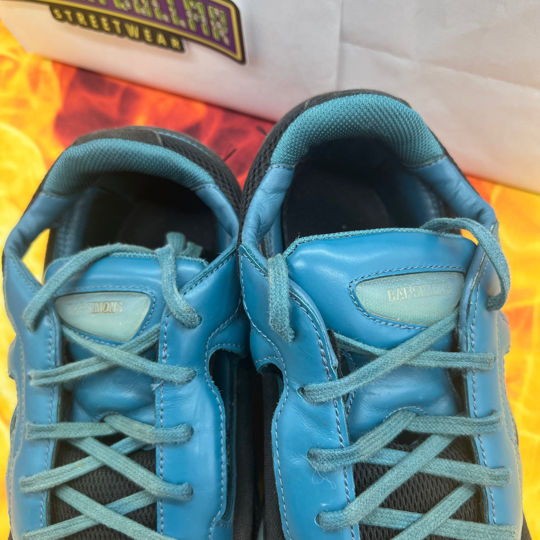Raf Simon’s replicant Ozweego black colonial blue- 9M